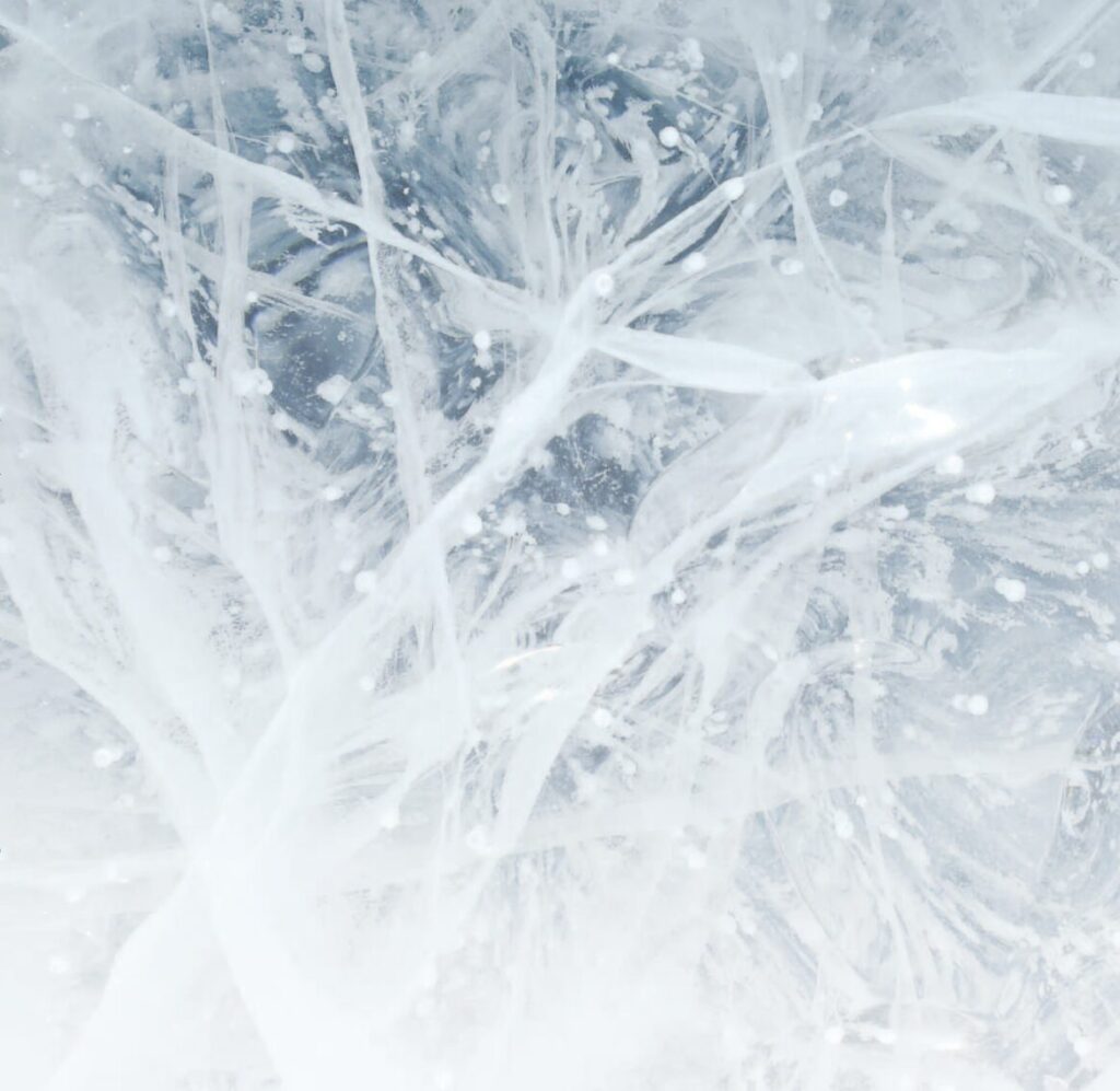 zugefrorenes Eisbohrloch am Canada Glacier