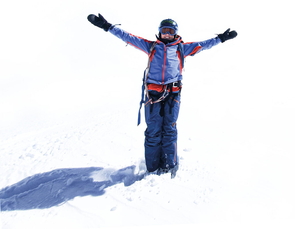 Mensch im Schnee mit Winterausrüstung